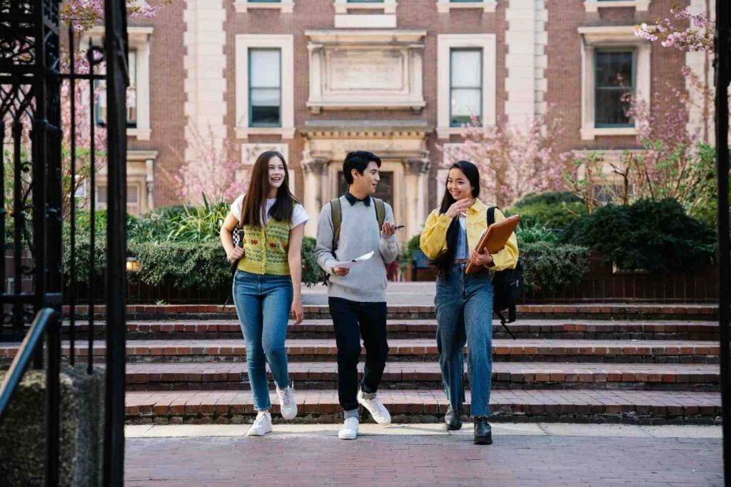 college students walking together
