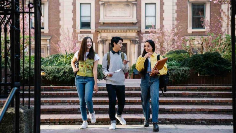college students walking together