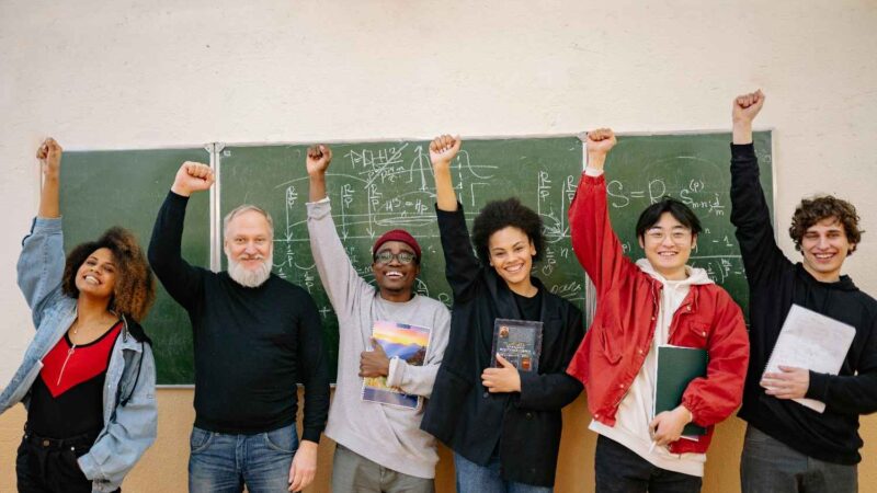 People raising their hands